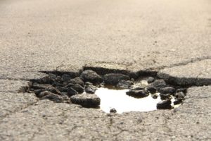 pothole-road-compressed